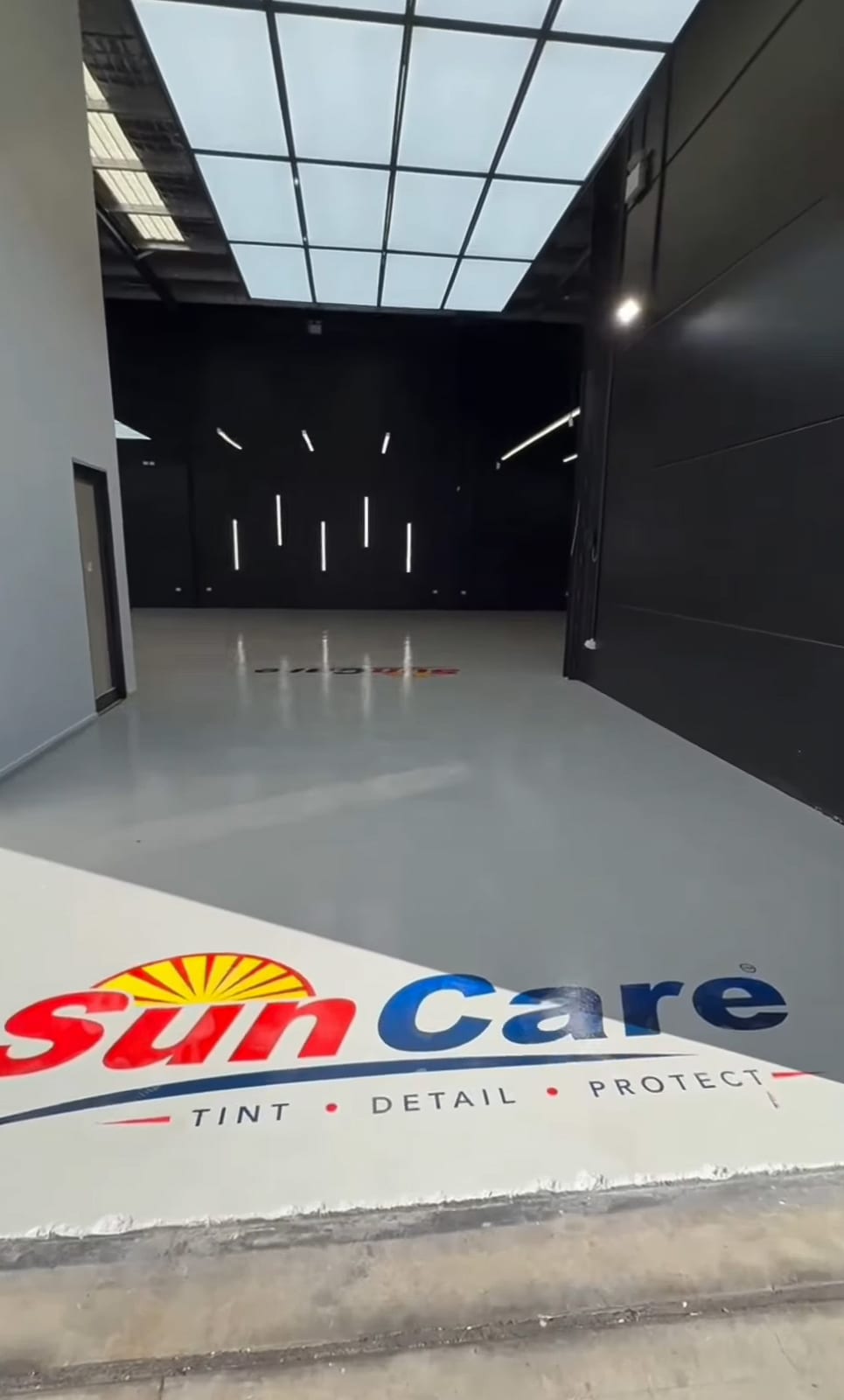 Inside the SunCare bay, logo on the floor