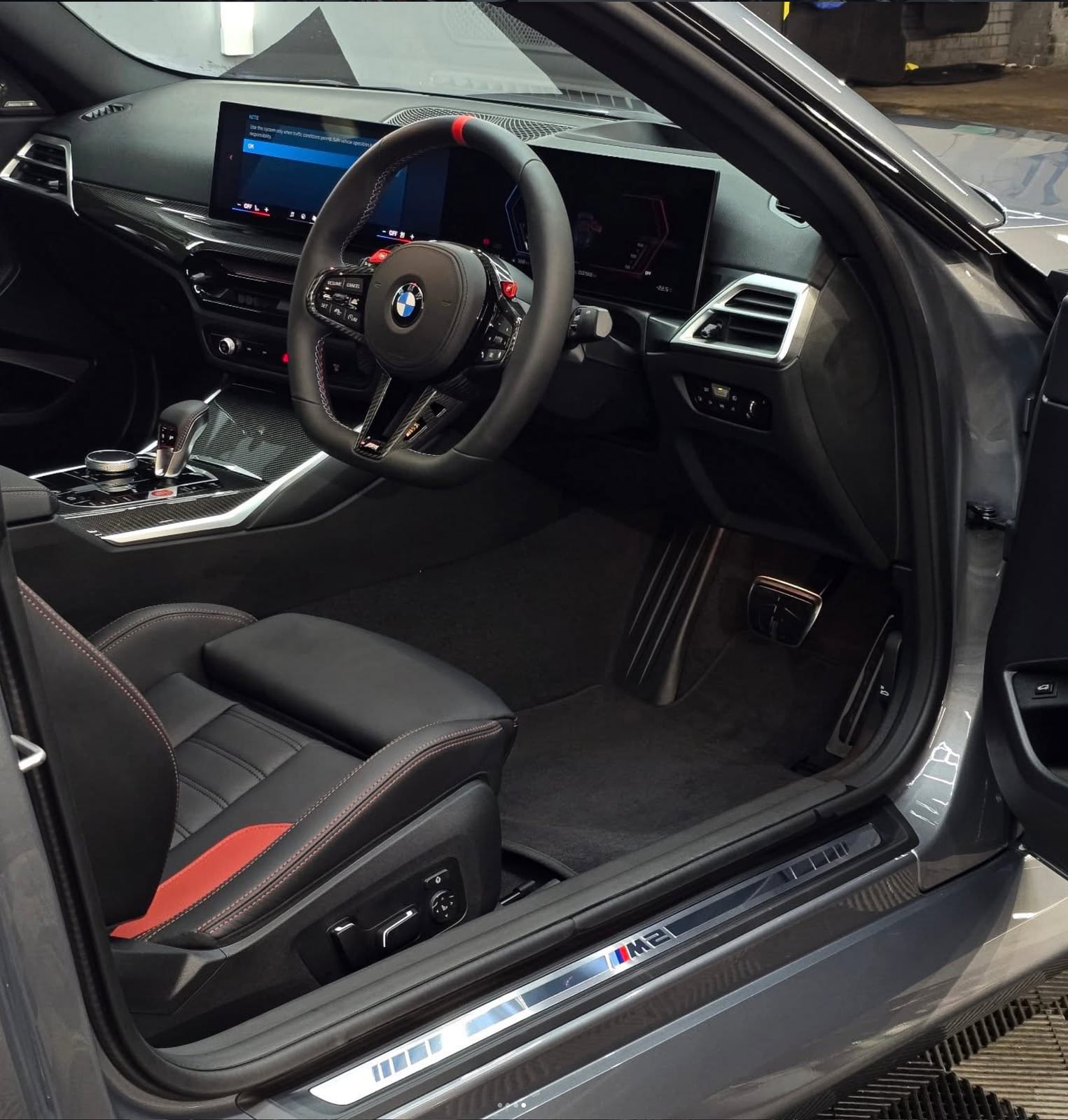 BMW M2 interior and door sill detail