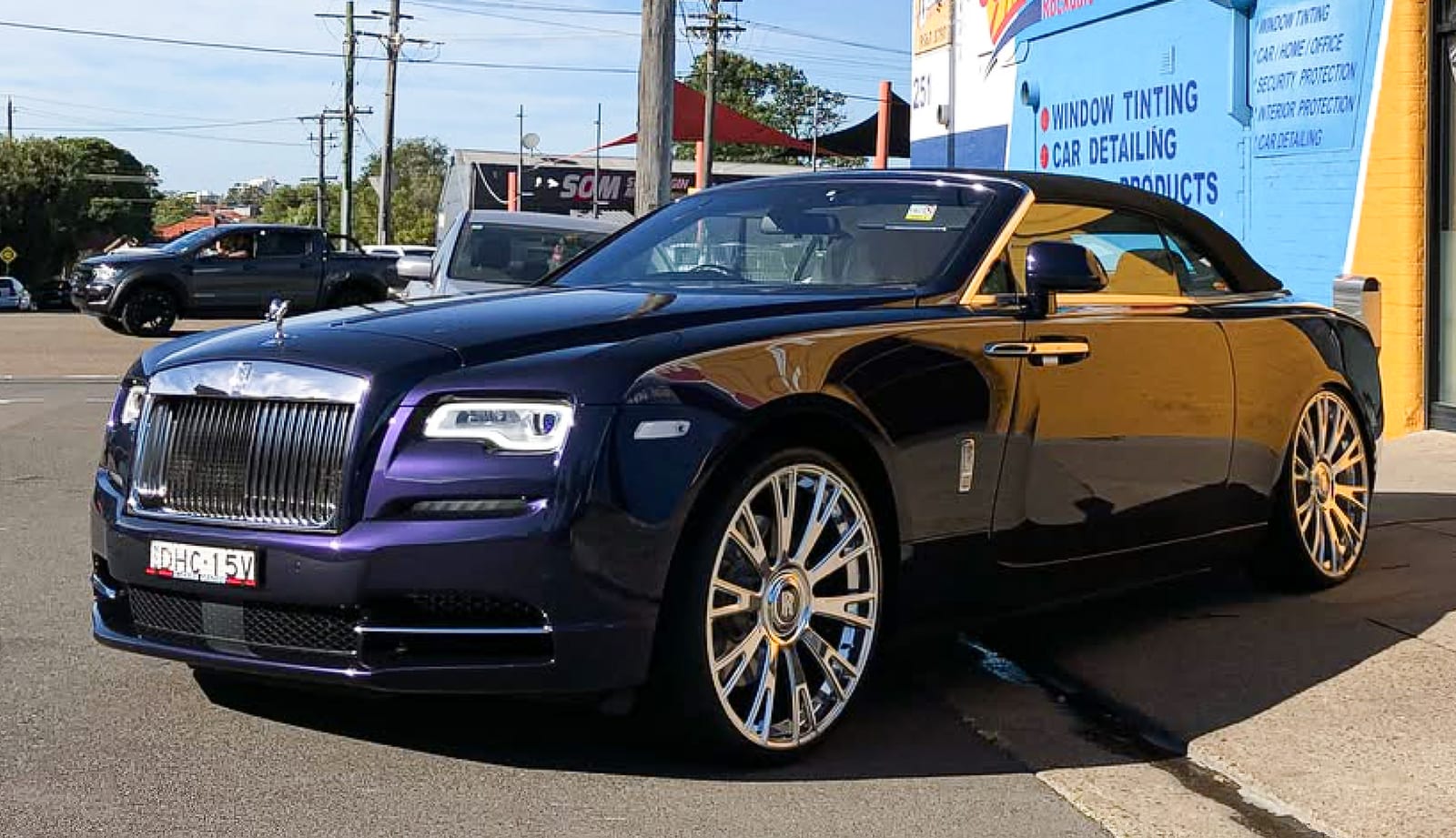 Rolls-Royce Dawn outside the SunCare shopfront
