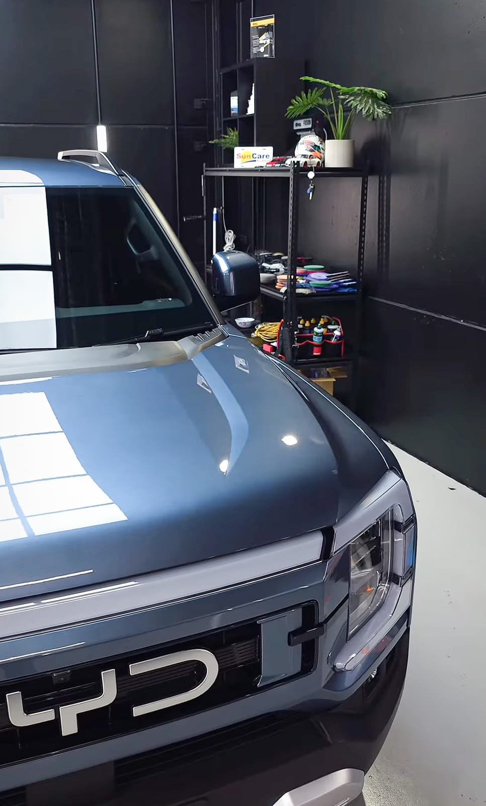 Ute hood in the bay, product shelf behind